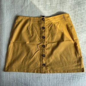 Yellow mini skirt